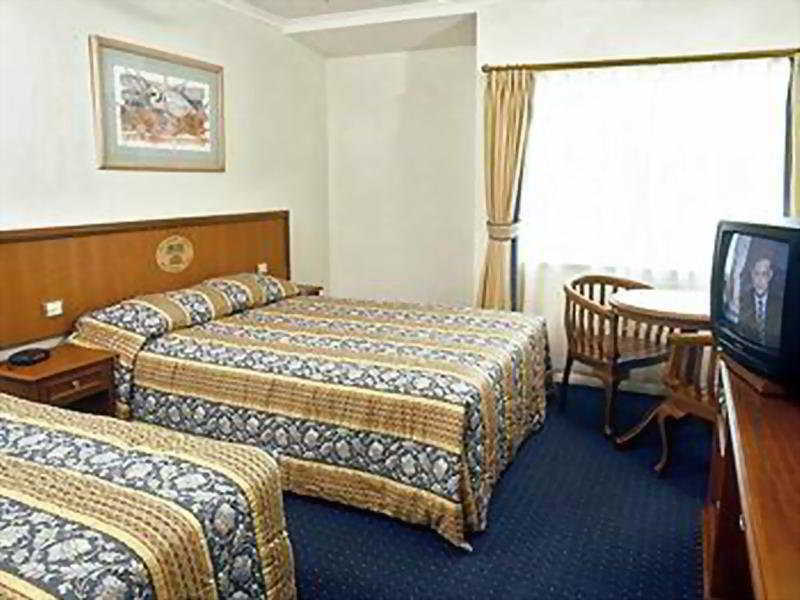 Motel Cairns Southside International Habitación foto